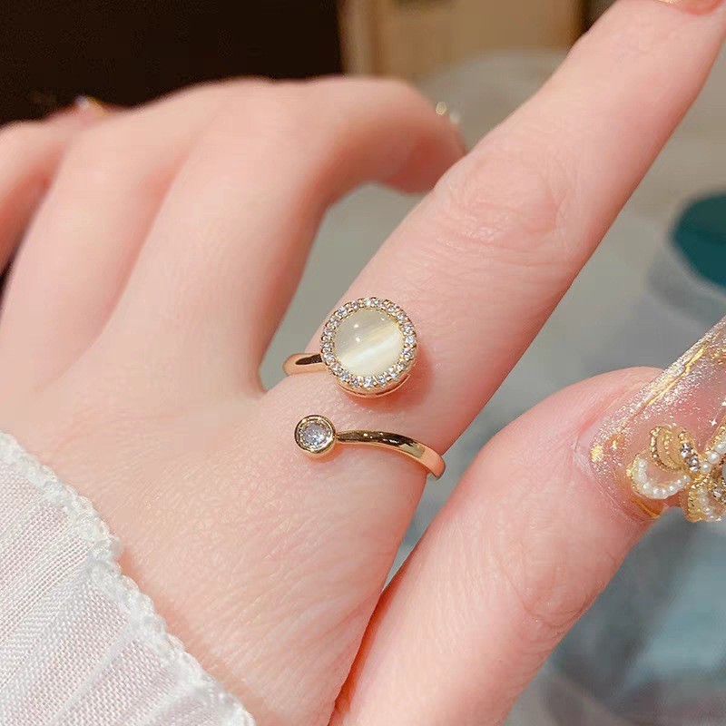 Cat's eye stone rotating ring women's opening adjustable diet finger ring niche temperament simple fashion Joker jewelry wholesale