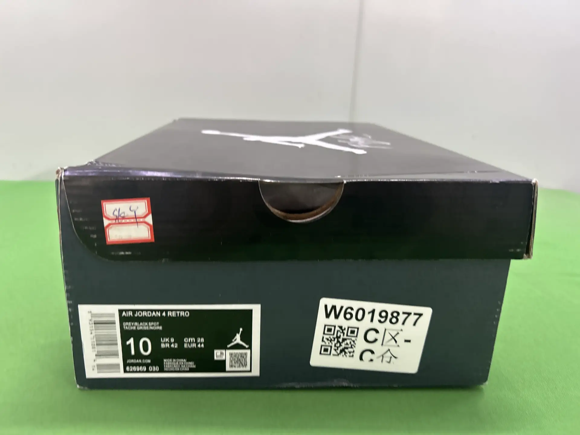 Air Jordan 4 Retro Grey Black Spot