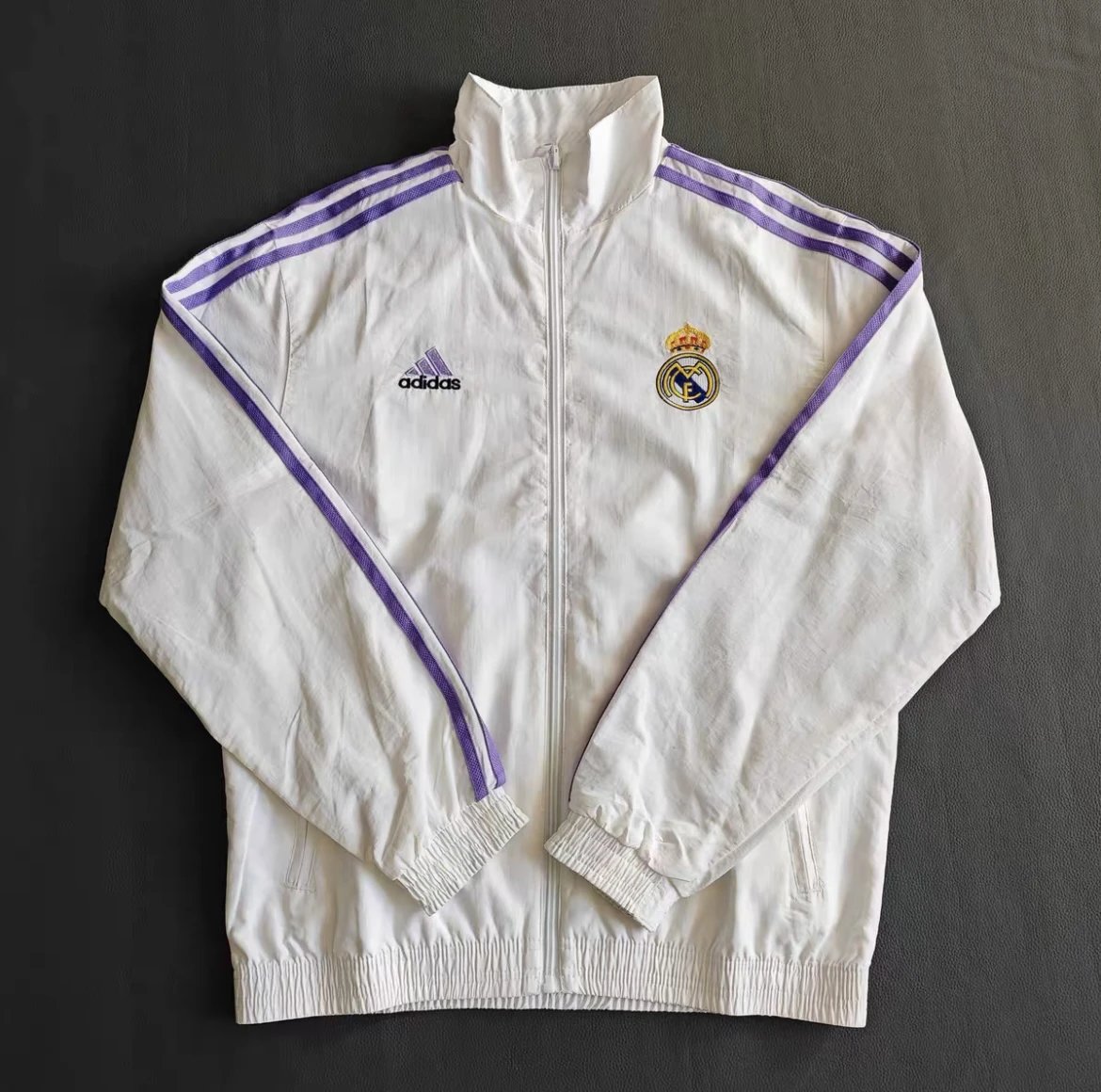 Brand-new Adidas Real Madrid reversible windbreaker.
