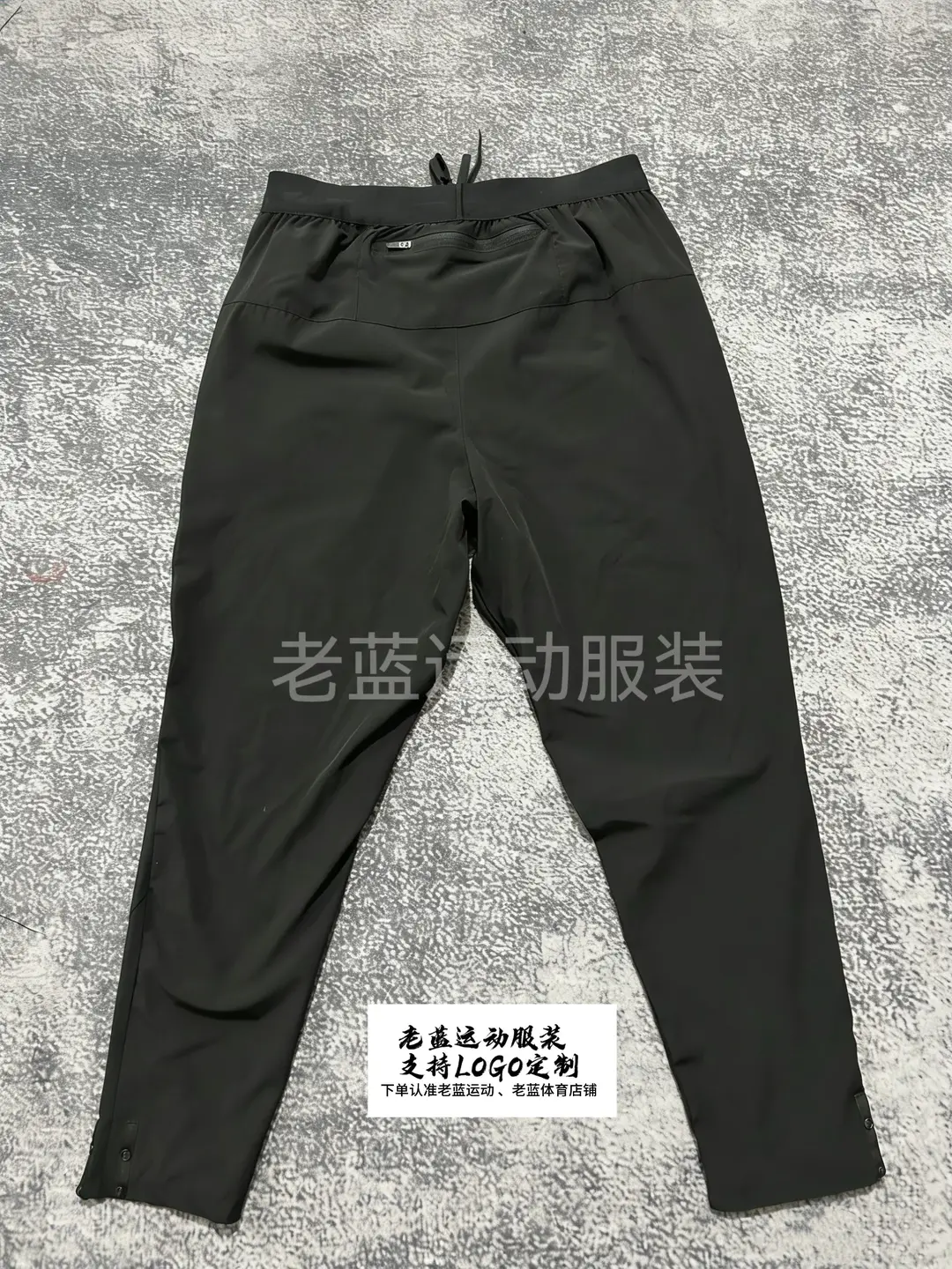Elite Quick-Drying Sports Pants for Marathon and Track and Field League Training with Buttoned Cuffs and Elasticated Drawstring Design