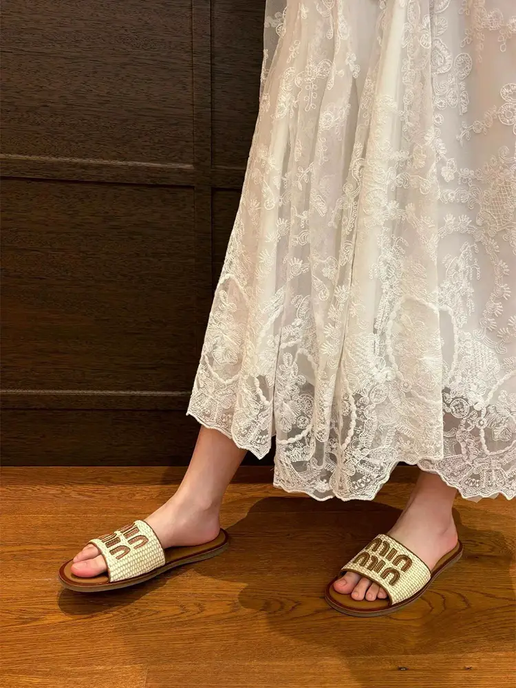 Hong Kong Genuine Leather letter Straw Slippers Women's 2025 Summer Outerwear Flats Fairy Style Beach Seaside Sandals