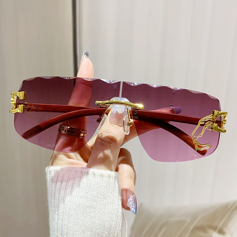 New Fashion Distinctive Irregular Wavy Edge Sunglasses Ins Frameless Design Wood Grain Leg one-body Sunglasses Trendy