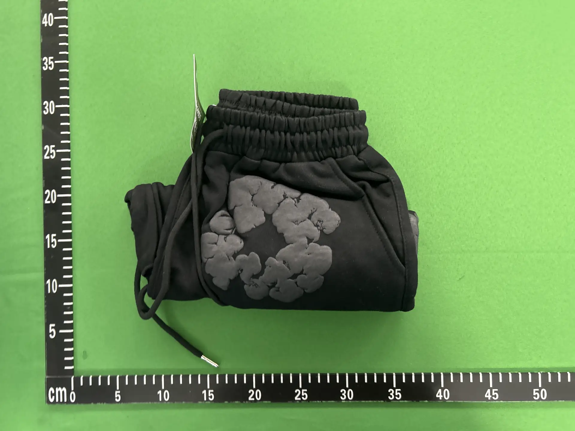 Black shorts with cloud graphic