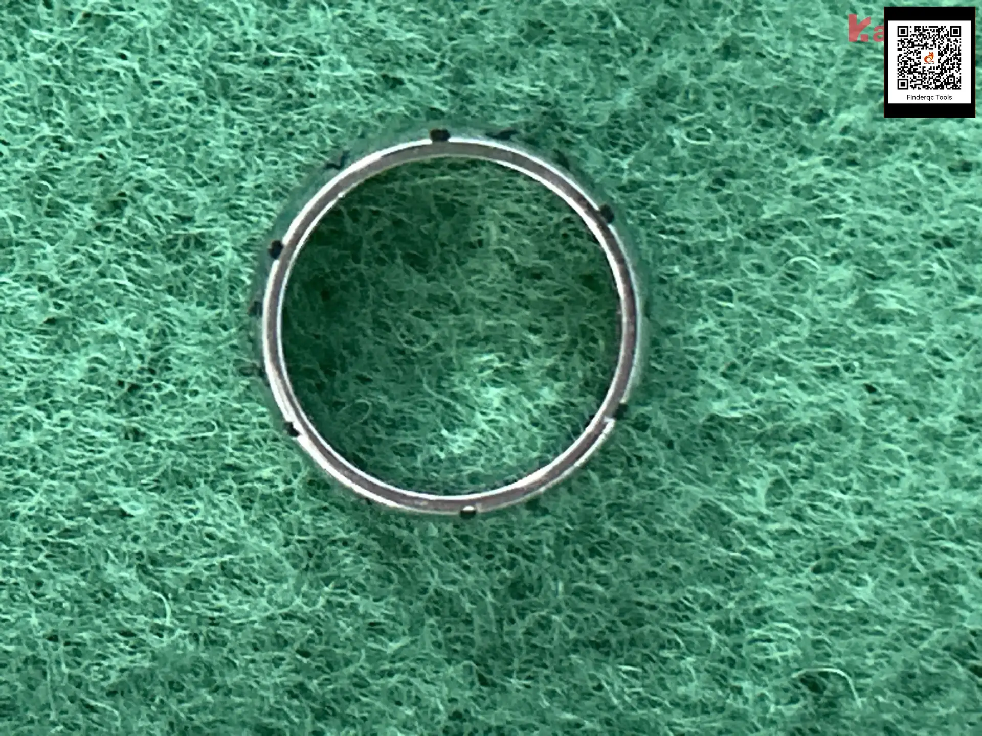 Silver ring with black accents