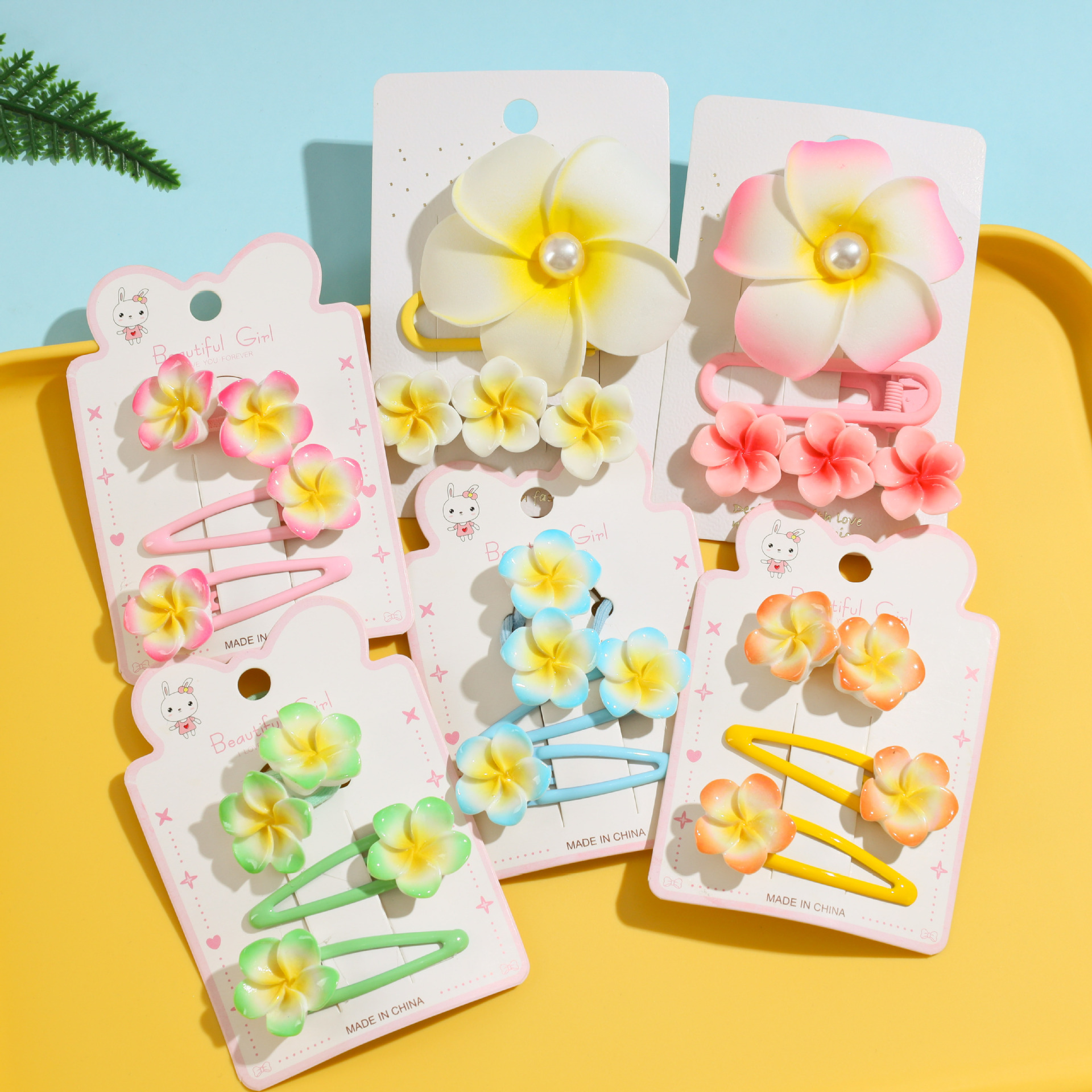 Rain elf sun flower children's hair accessories egg flower pearl hairpin seaside beach travel photo decorations wholesale