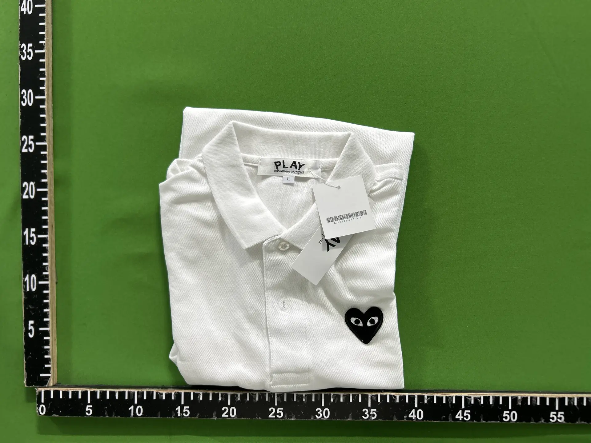 Comme des Garçons PLAY White Polo Shirt with Black Heart