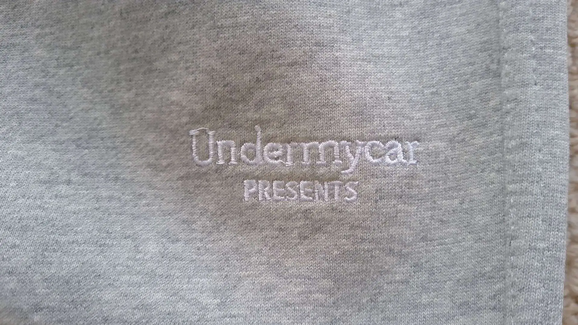 Undermycarchive gray sports pants with a heavy silhouette and lazy all grey pleated ankle sweatpants