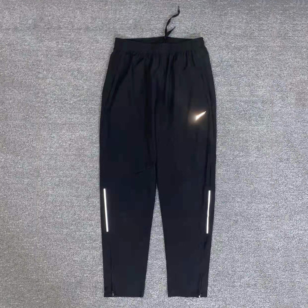 New Training Quick-Drying Trousers Half-Zip Training Pants Breathable Quick-Drying Running Fitness Outdoor Reflective Sports Pants foto QC de 1688 en Qualit.ly