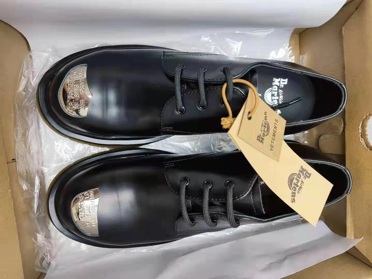 Dr. Martens × Raf Simons co-branded iron-toed Martin Derby shoes
