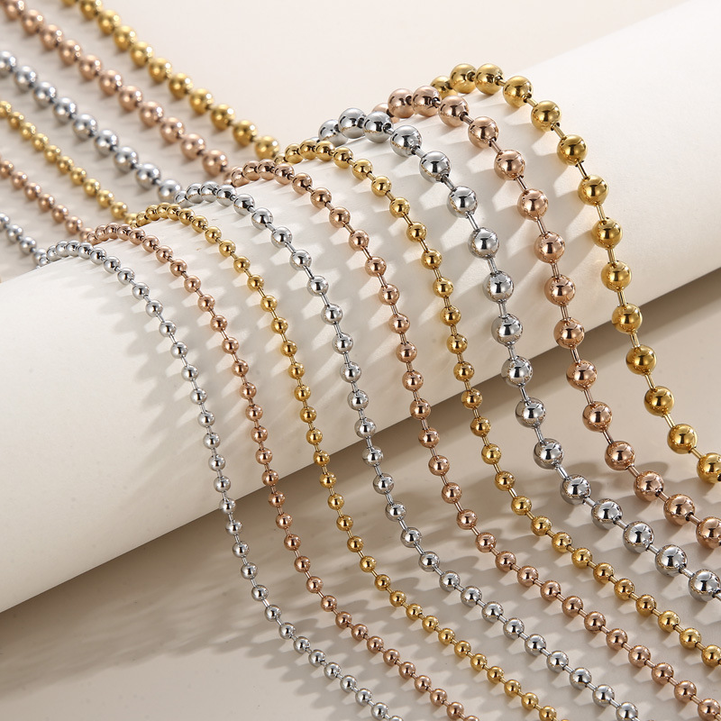 Cross-border European and American style cool personality temperament gold pigment chain hollow round beads multi-size titanium steel necklace wholesale