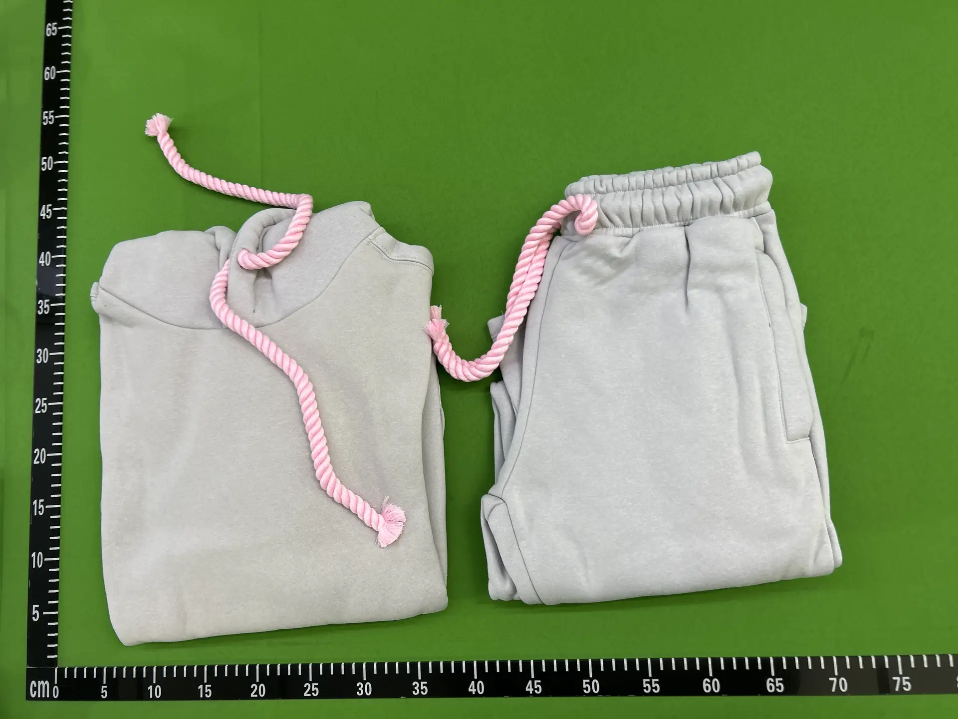 Loose hooded sweatshirt on the street#