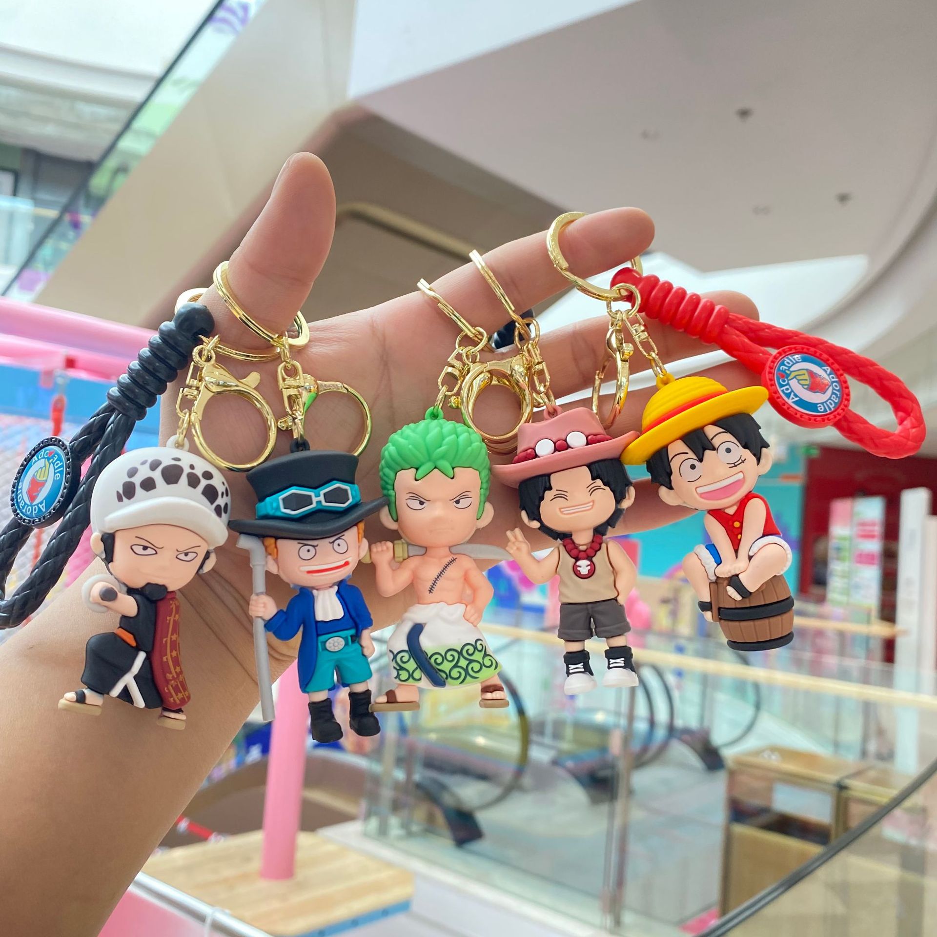 Cross-border creative animation surrounding one piece key chain female cartoon doll couple bag pendant small gift wholesale