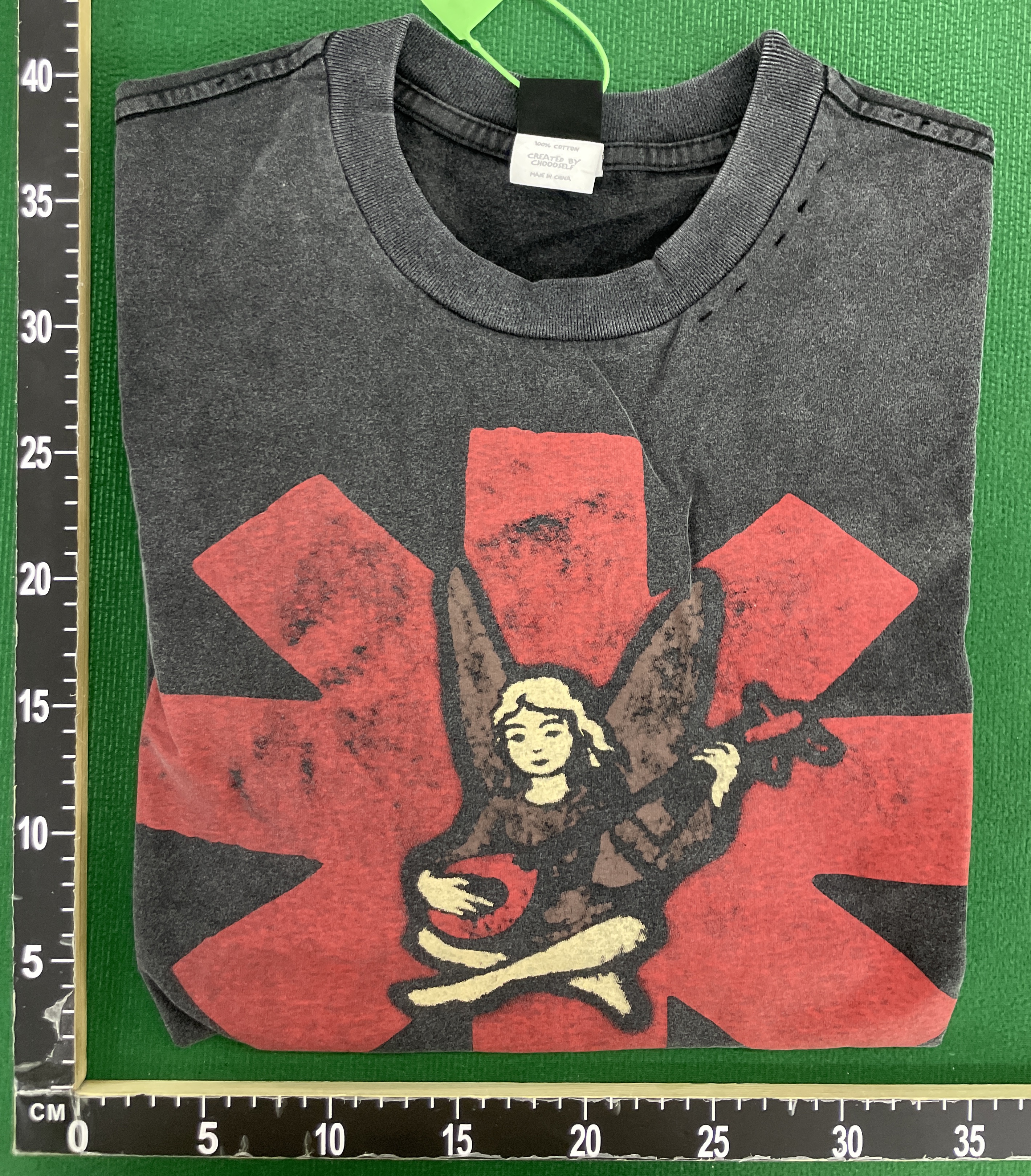 T-shirt — foto QC 1 di 5