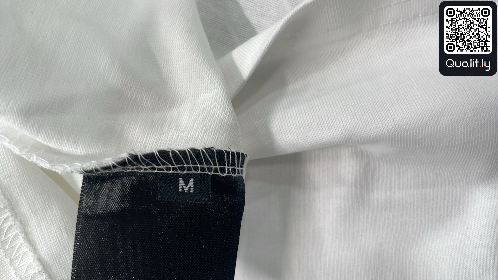 T-shirt — foto QC 1 di 4