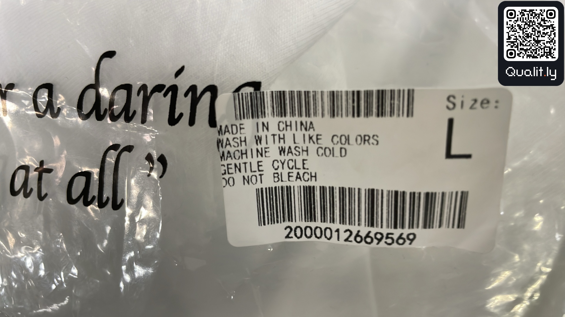 T-shirt — foto QC 1 di 4