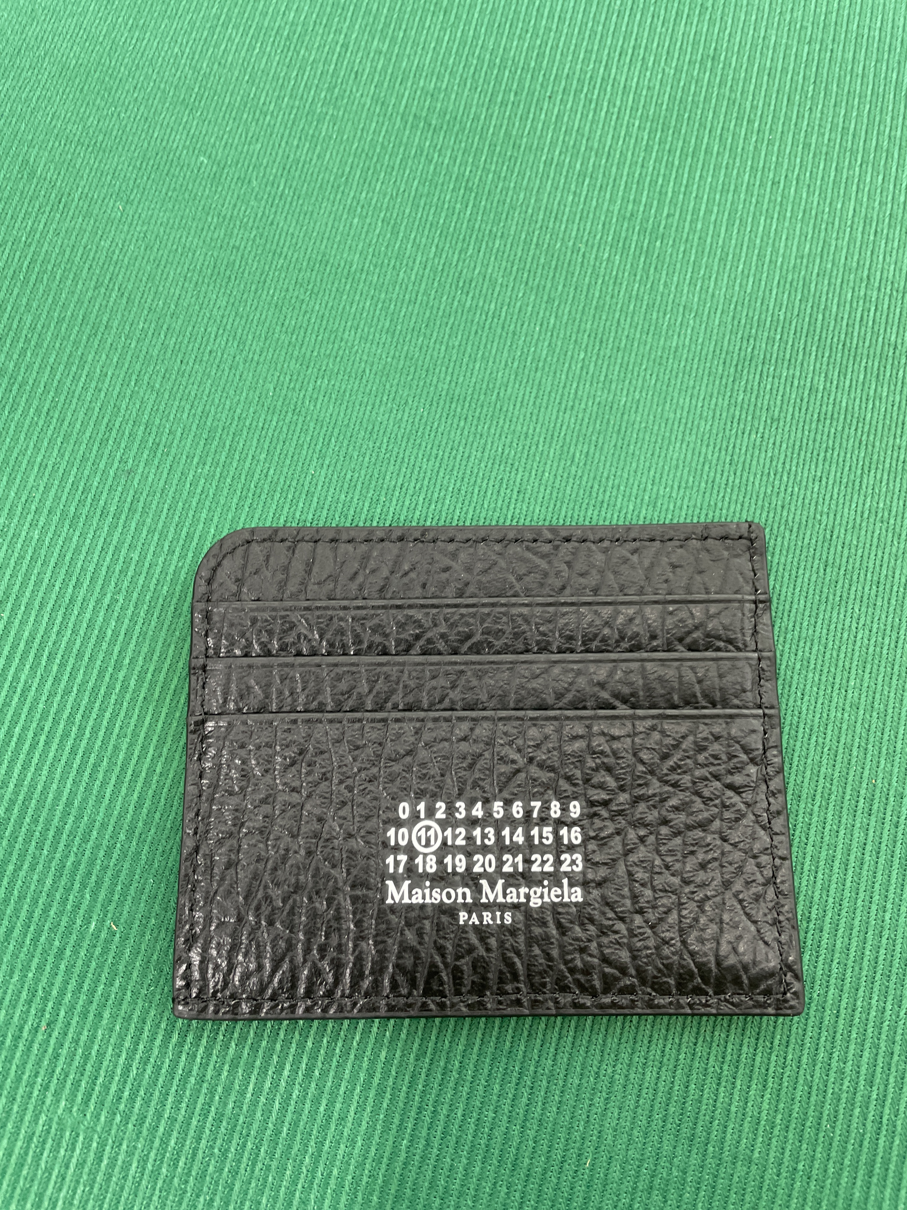 Cartera — foto QC 1 de 50