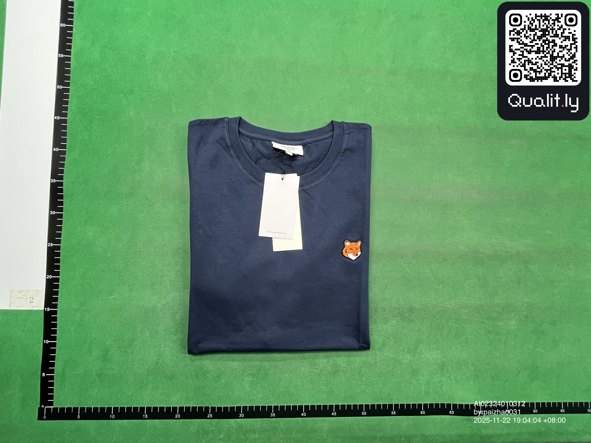 T-shirt — foto QC 1 di 8