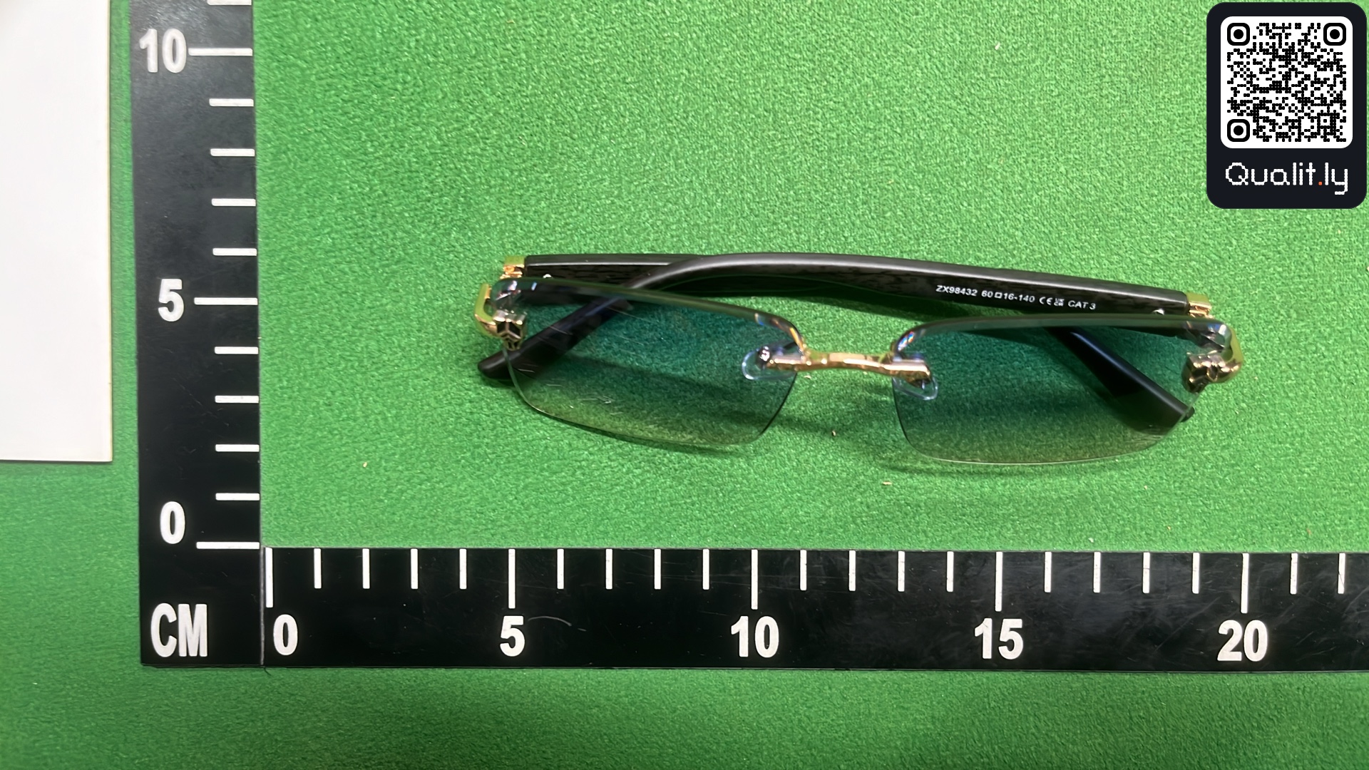 Sunglasses QC photo 1 of 3