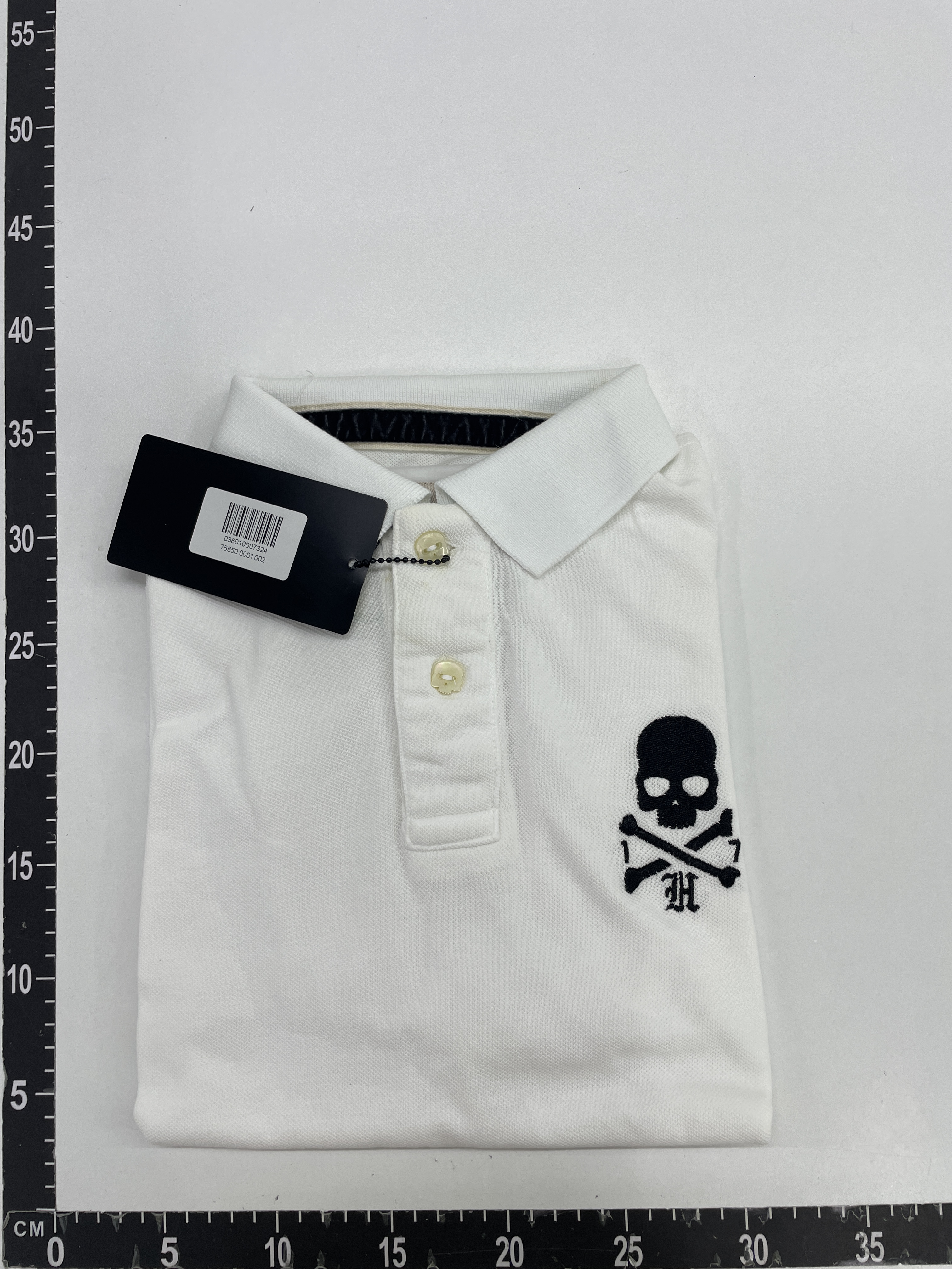 T-shirt — foto QC 1 di 9
