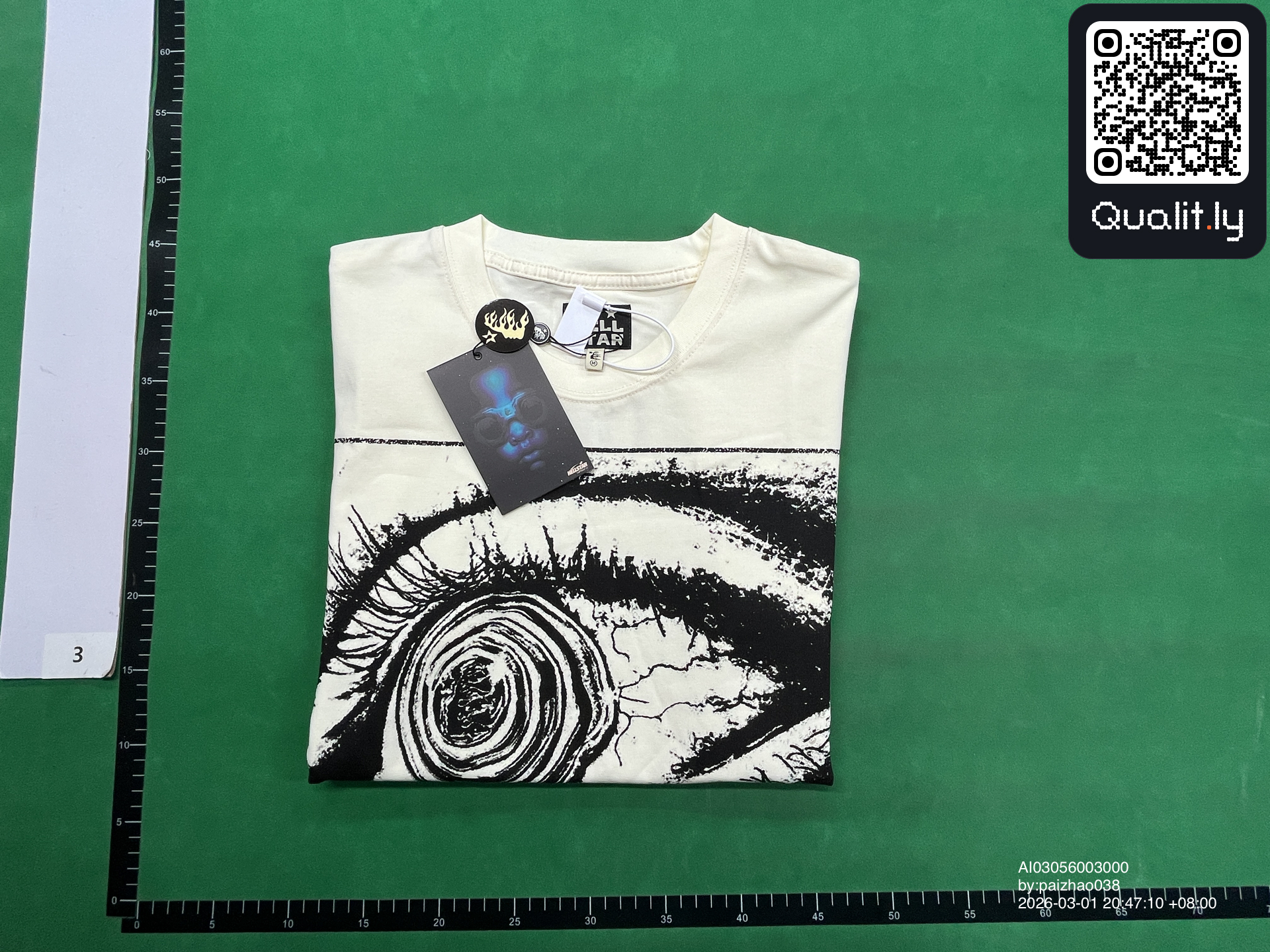 T-shirt — foto QC 1 di 4