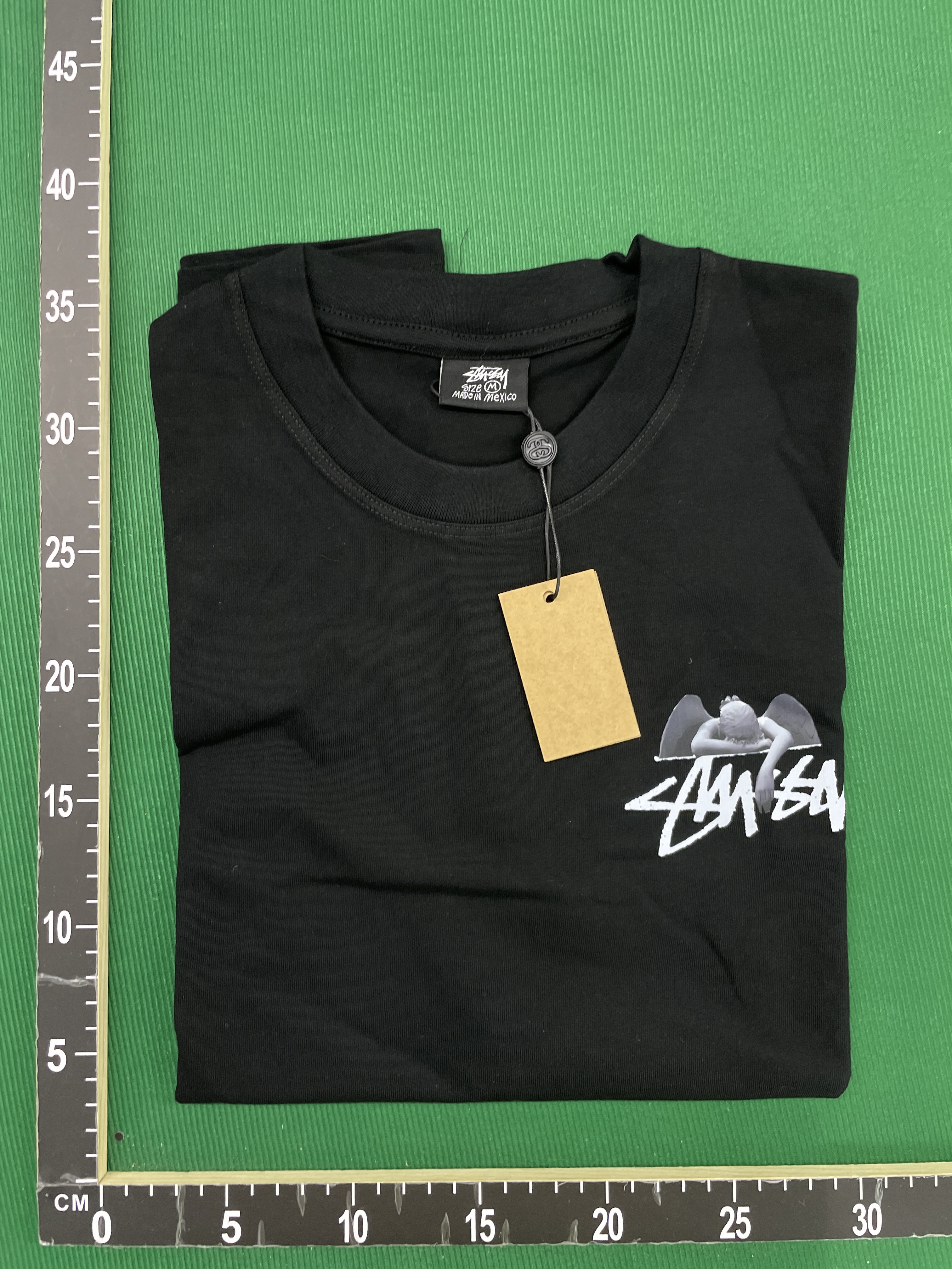 T-shirt — foto QC 1 di 32