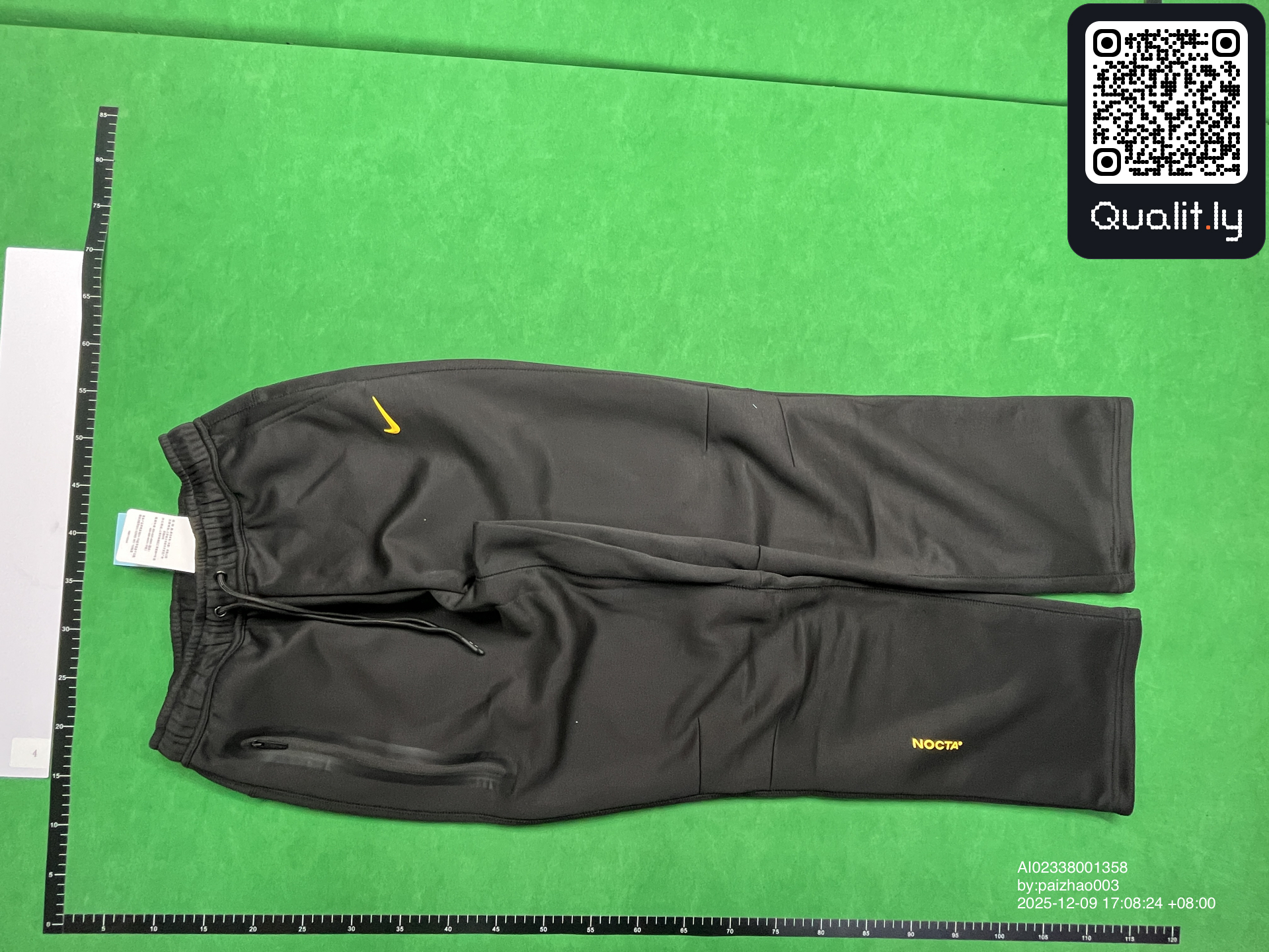 Tuta — foto QC 2 di 4