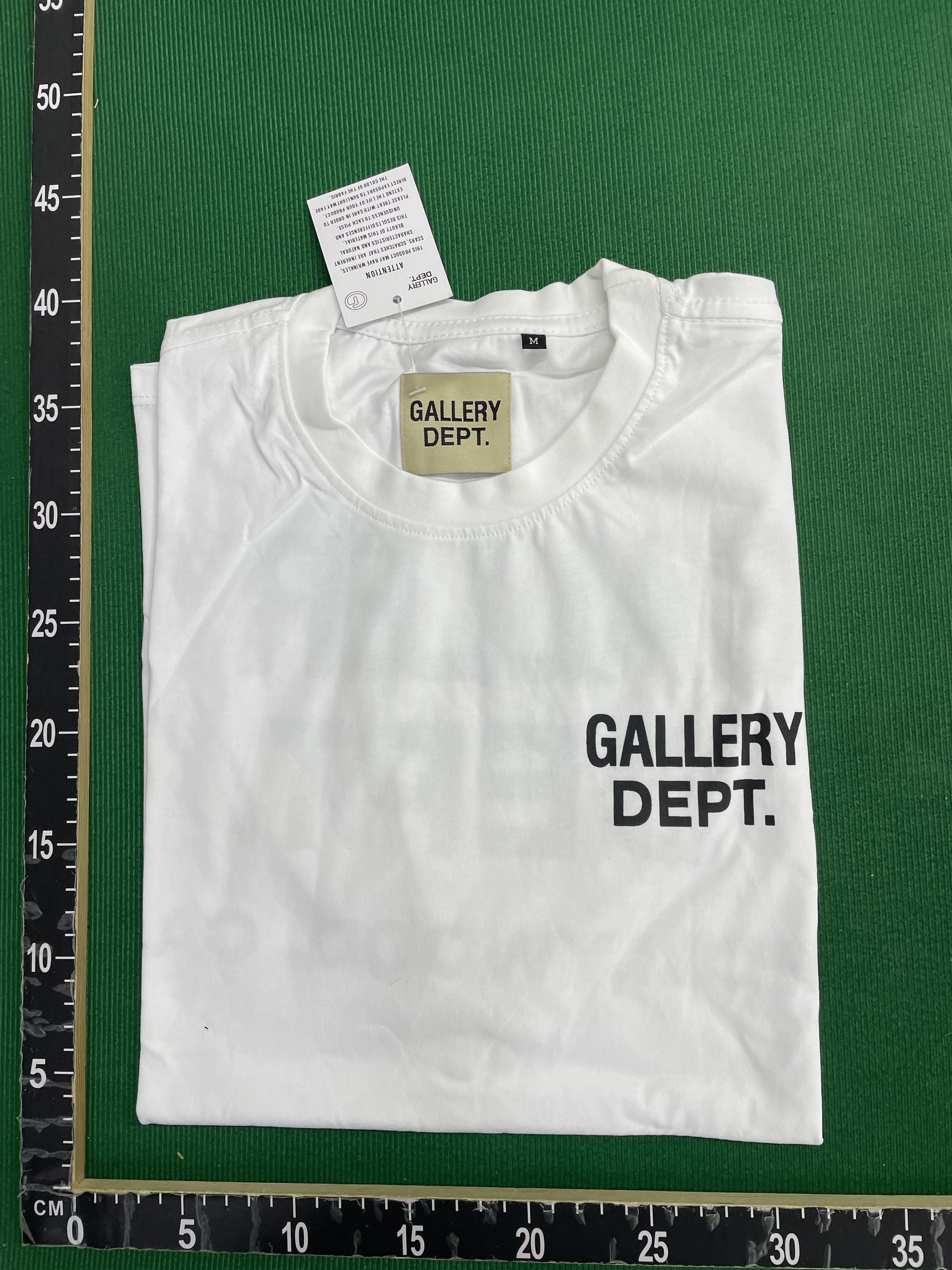 T-shirt — foto QC 1 di 10