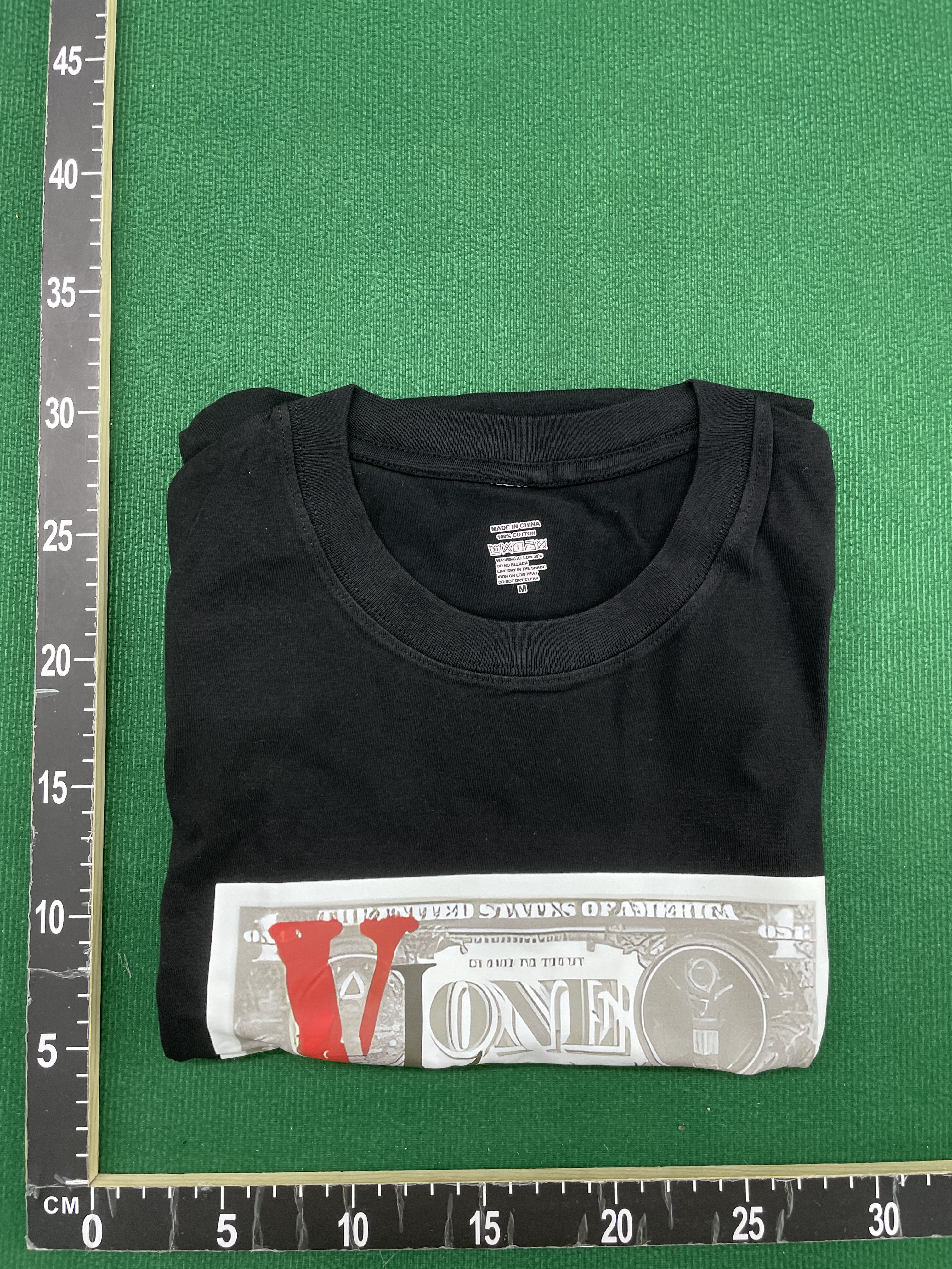 T-shirt — foto QC 1 de 12