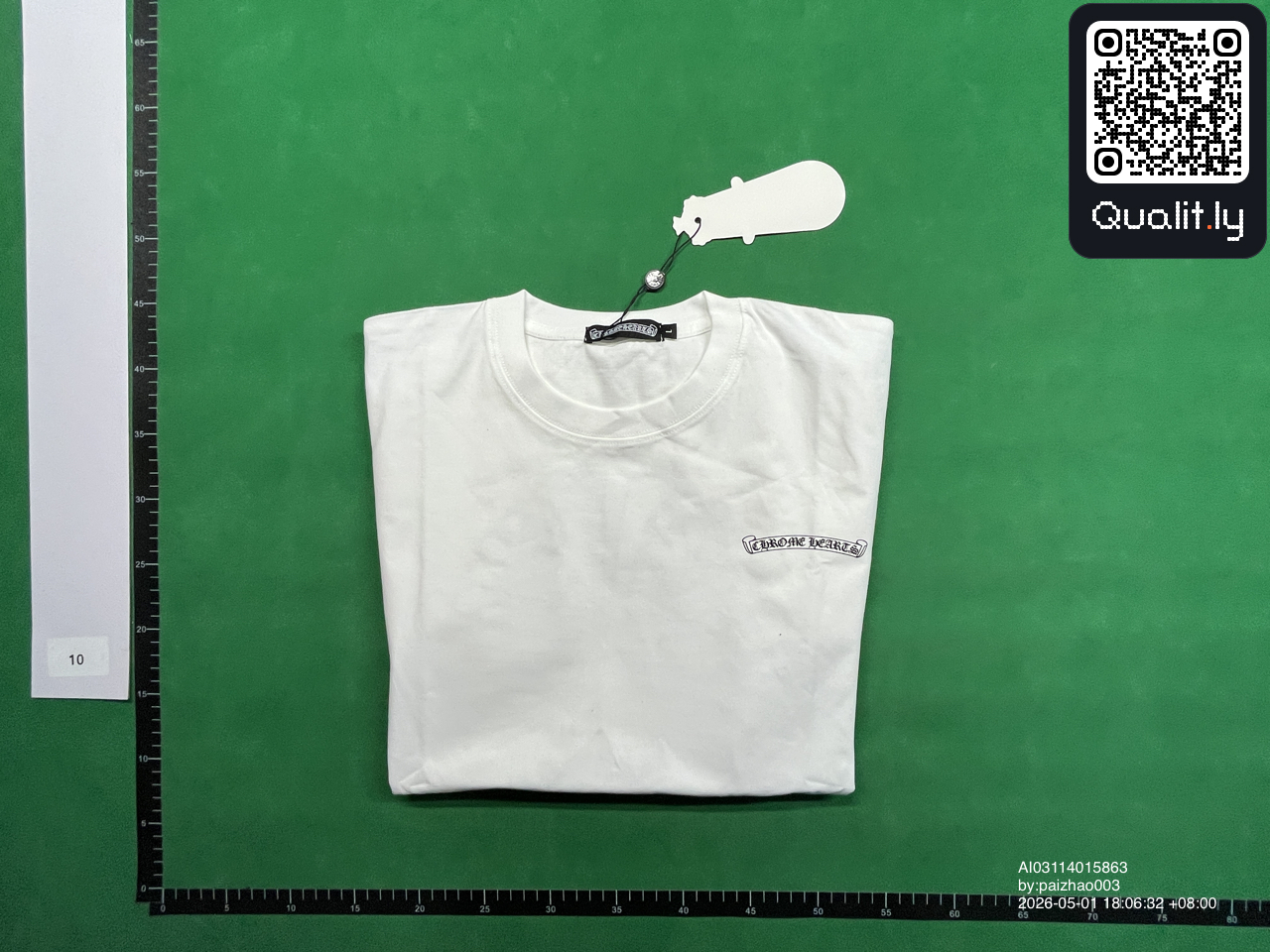 T-shirt — foto QC 1 di 4