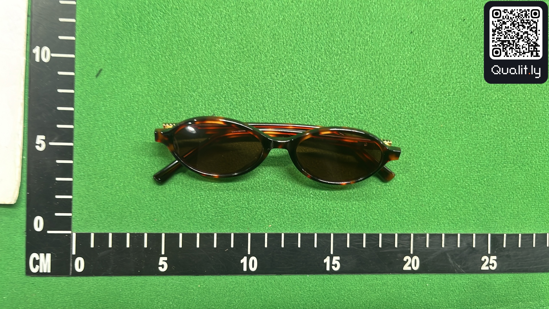 Sunglasses QC photo 1 of 3