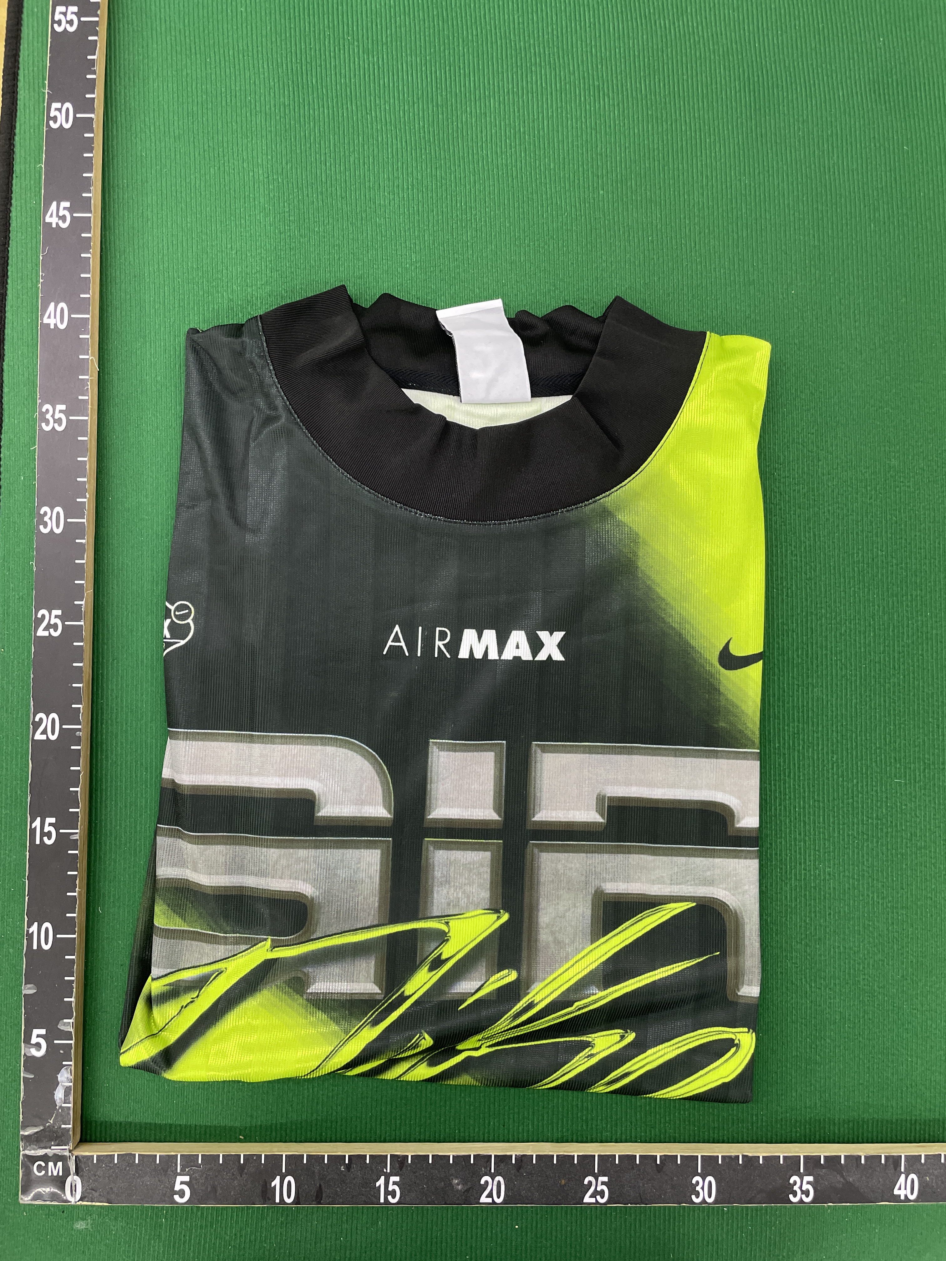 T-shirt — foto QC 1 di 9