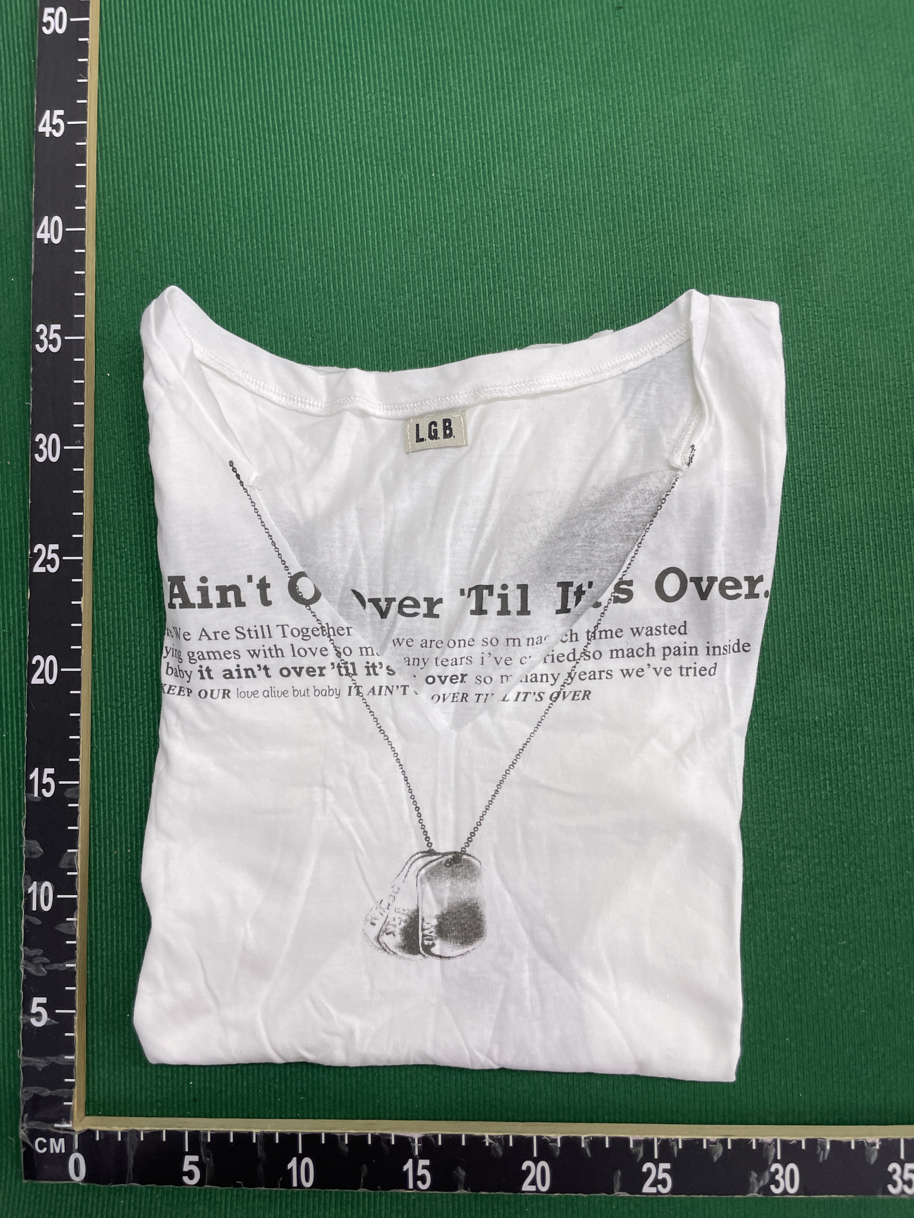T-shirt — foto QC 1 di 5