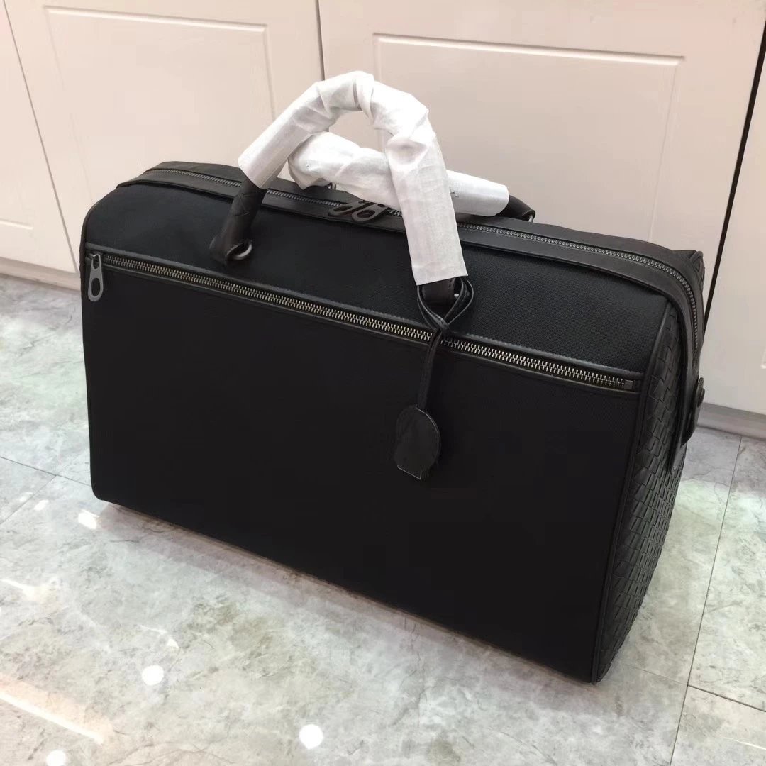 特价550元！经典款打蜡胎牛皮 旅行包 专柜绵灰里配布 新品休闲编制黑色 大容量 旅行袋 男包